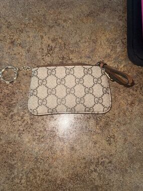 Gucci emblem key pouch